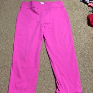 Bright pink stretchy pants with cute detail at bottom